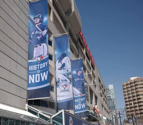 Large-format vertical stadium banners produced and installed by C17 Media on a Toronto sports venue exterior